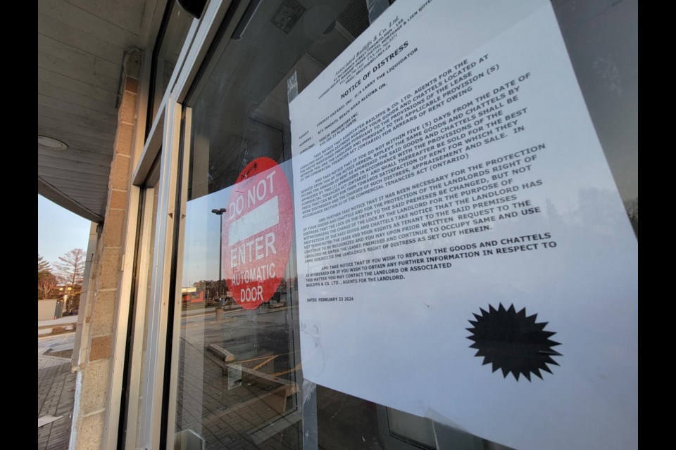 The notice of distress posted on the former Larry the Liquidator store on Innisfil Beach Road.