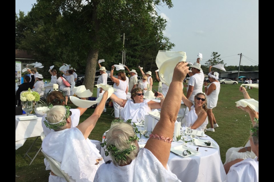The Innisfil Arts, Culture and Heritage Council’s Dinner in White is an annual pop-up picnic event that gathers community groups and individuals.