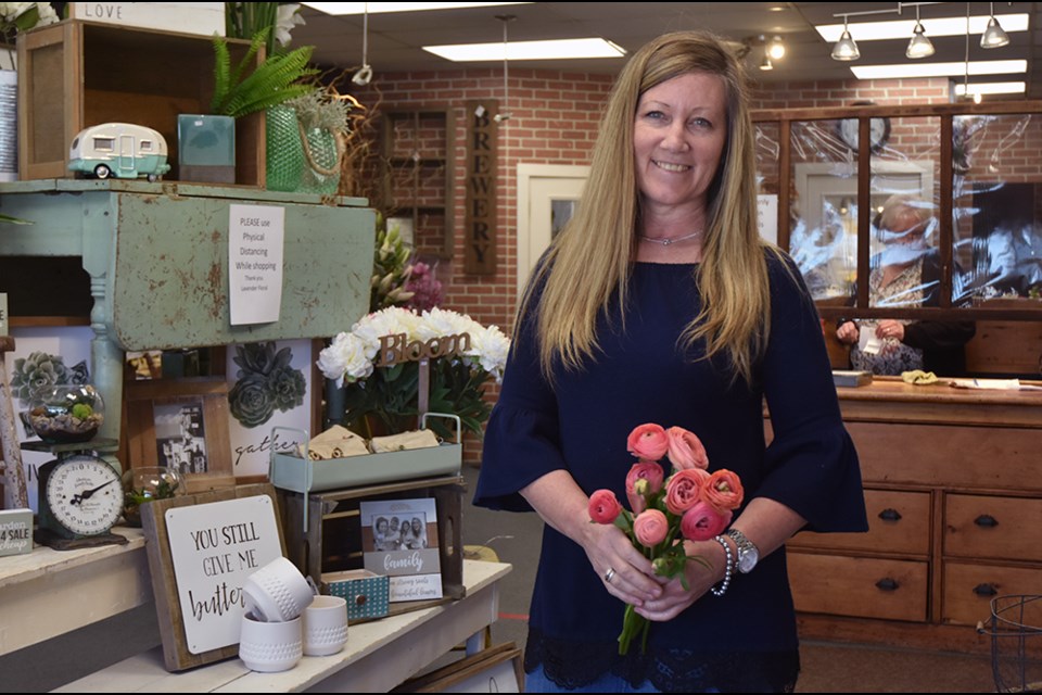 Sherie Britnell, owner of Lavender Floral in Stroud, welcomes shoppers inside the store for first time in over a month. Miriam King/Innisfil Today
