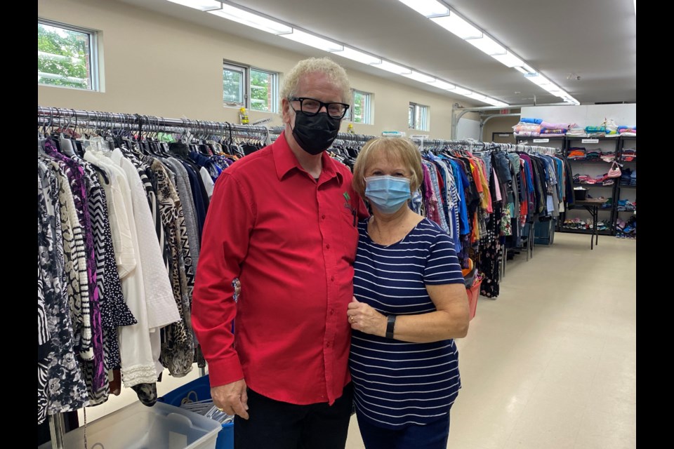Pastor Howard Courtney and wife Beulah inside The Clothing Depot at Innisfil Community Church