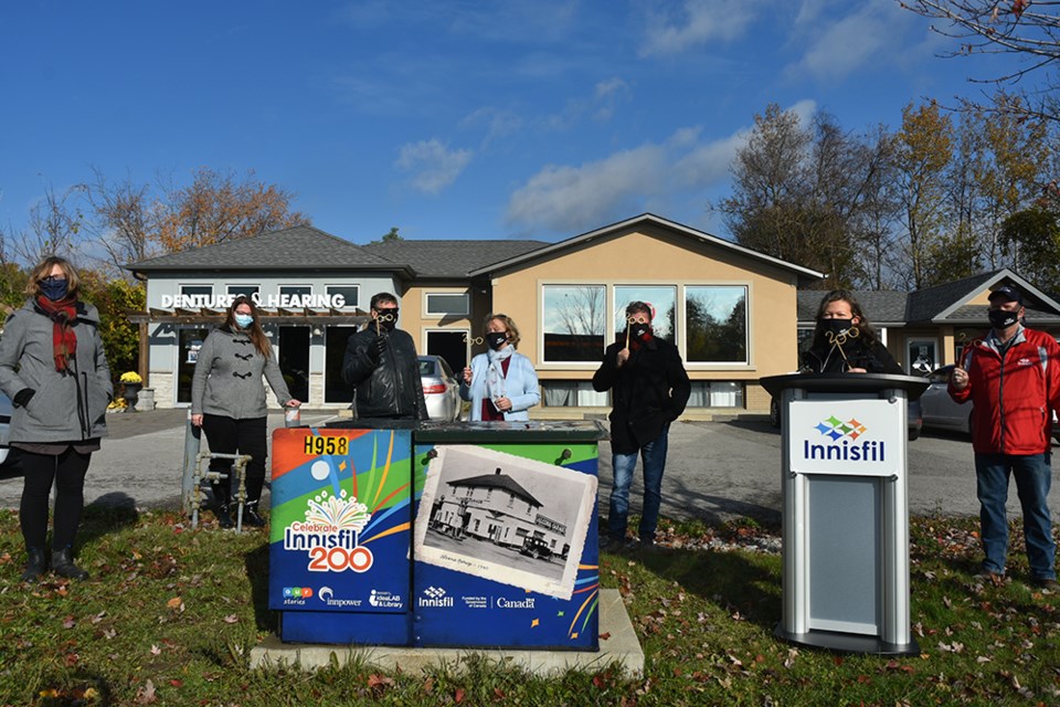 Innisfil Mayor Lynn Dollin, members of Council, and ideaLAB staff unveil decorated utility box, for Innisfil's Bicentennial. Miriam King for Innisfil Today