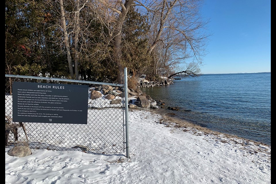 Fence has been restored, between Block B and Friday Harbour's beach, but there is clear access.