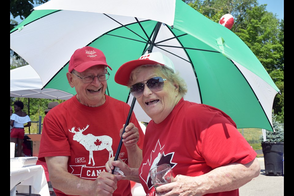 Phyllis McMillan and Stan Daurio looked festive at the Canada Day street party on Sproule Street. Miriam King/Innisfil Today