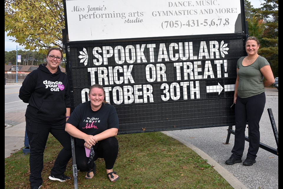 Monique Siozou, right, of Johnny Burger, and Jennie Chapman and Kate Badger of Miss Jennie's Performing Arts Studio are partnering to present Spooktacular.