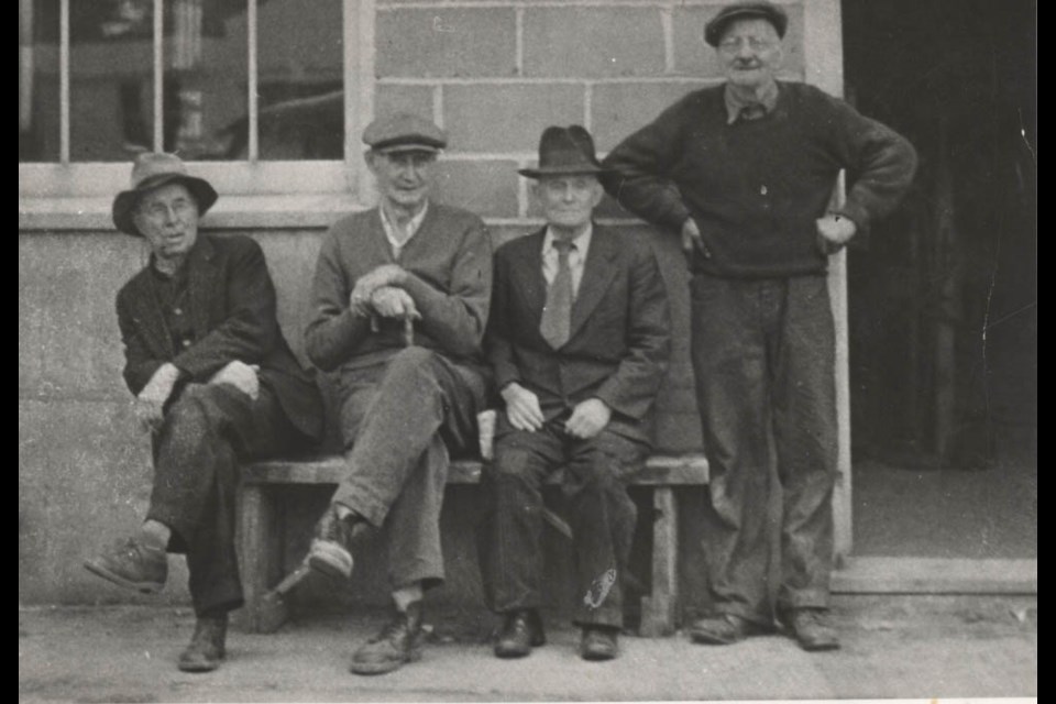 An aged George Shering stands at right.