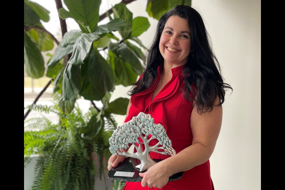 Jaime Grant, market manager of the Innisfil Farmers’ Market (IFM), holds the trophy awarded to the IFM when named Market of the Year 2022 at the Ontario Fruit and Vegetable Convention on Feb. 22, 2023.