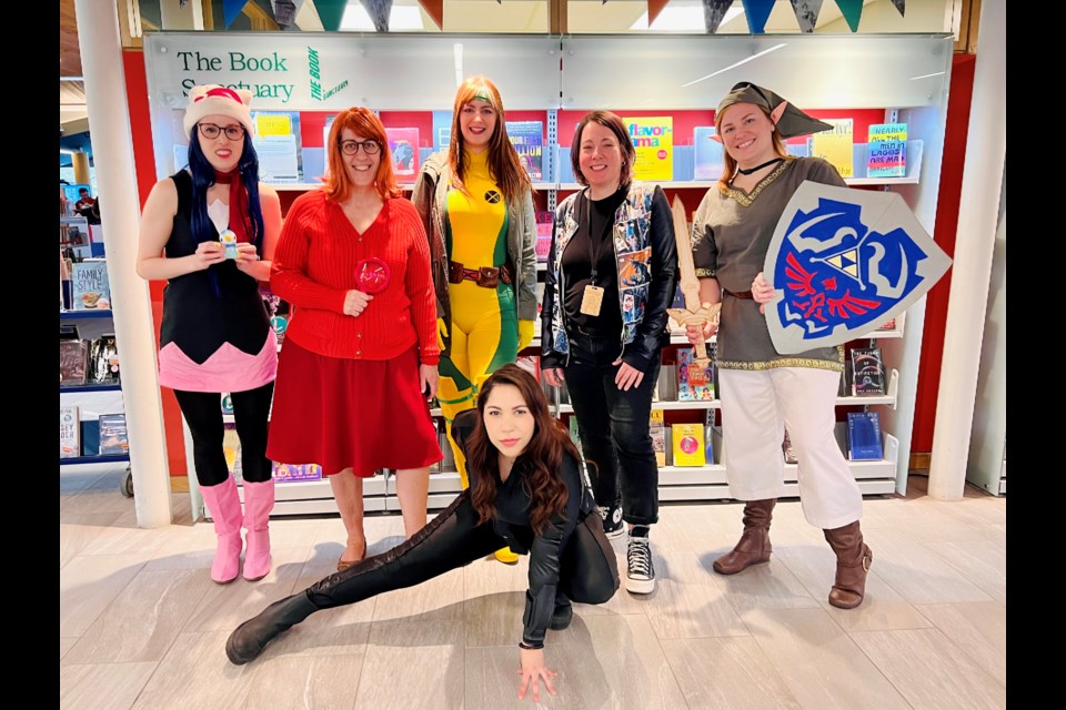 Staff of the Lakeshore branch of the Innisfil ideaLAB & Library in costume for ComicFEST.