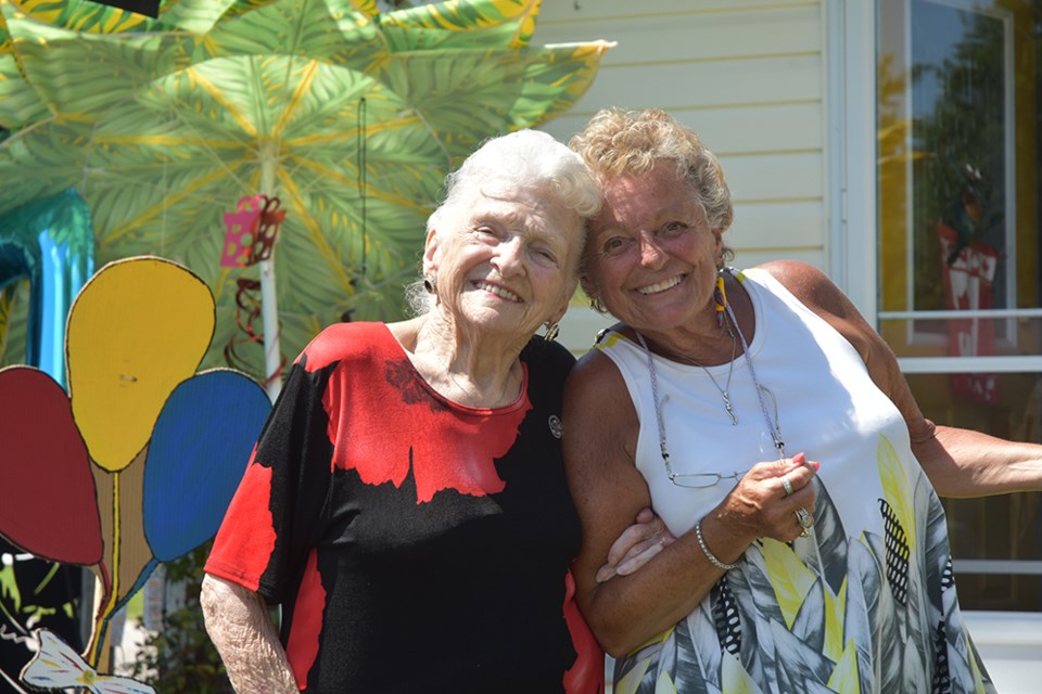 Irene Cartwright of Cookstown and daughter Lynda Fradenburgh prepare for a birthday parade. Miriam King/Innisfil Today