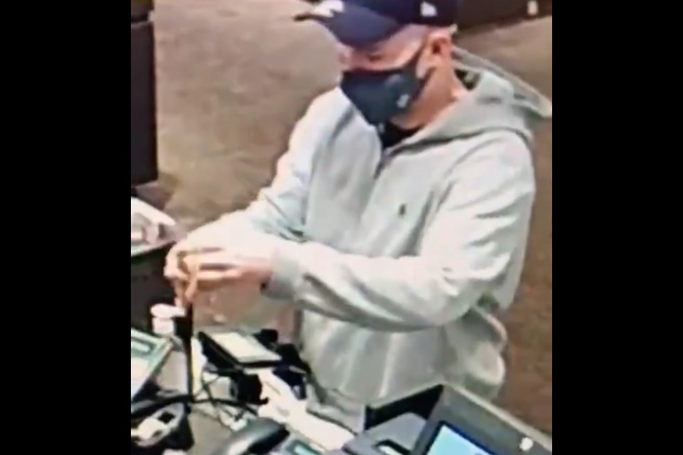 Still from security camera footage of a theft at Tanger Outlets in Cookstown.