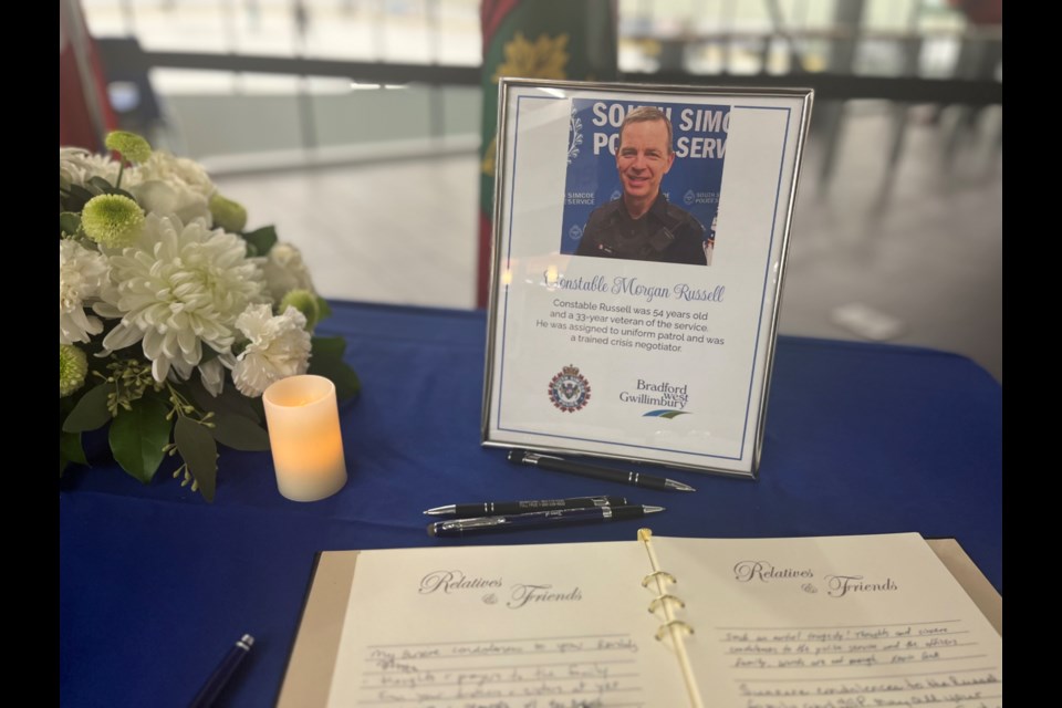 Book of condolences for South Simcoe police Const. Morgan Russell at the Bradford Leisure Centre. Russell, 54, was shot while responding to a disturbance call in Innisfil on Tuesday night. 