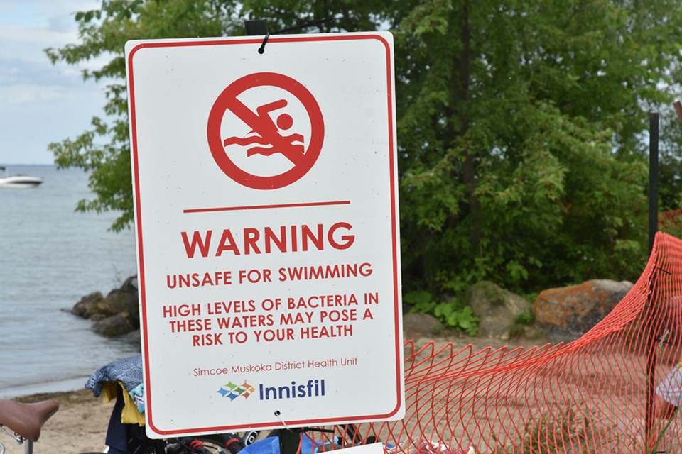 Visitors to Innisfil Beach Park may not be noticing the swim advisory signs, posted at beaches 2 through 5 at the north end of the park. 