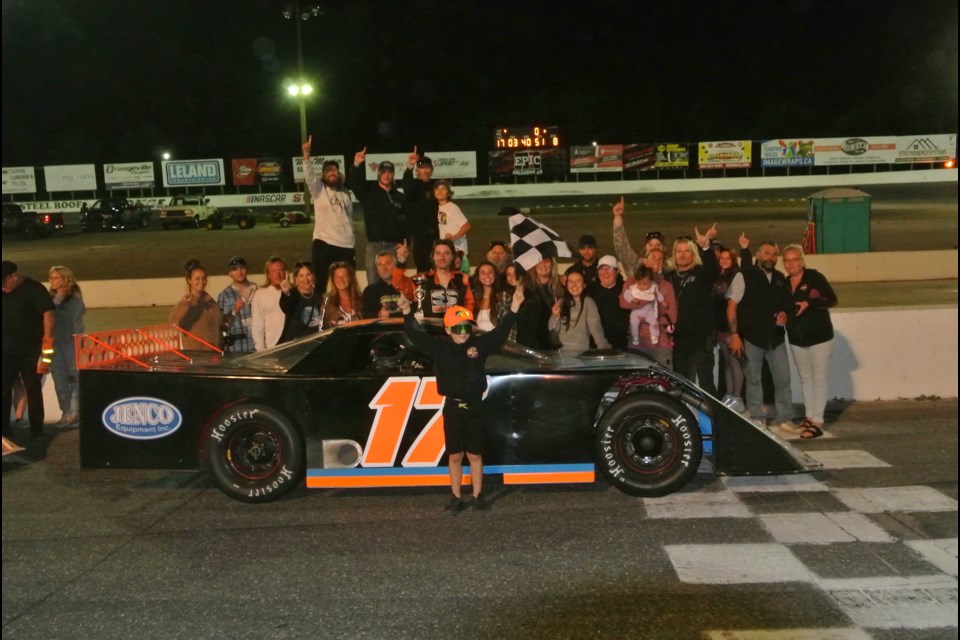 Brandon Passer wins at his home track and celebrates with family and friends in Victory Lane.