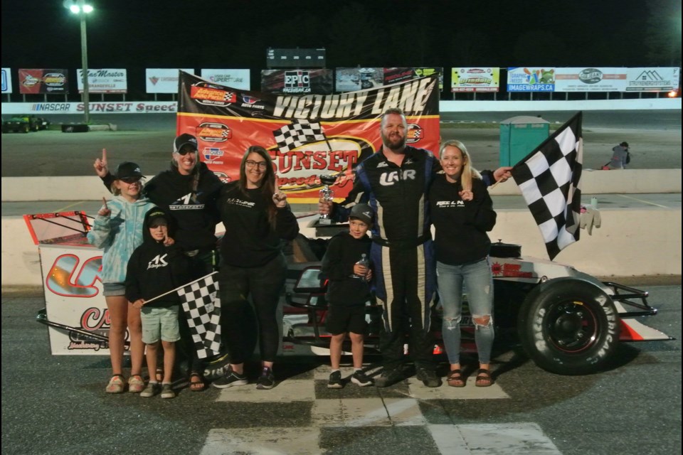 Andy Kamrath celebrates with his team after sweeping both feature races 