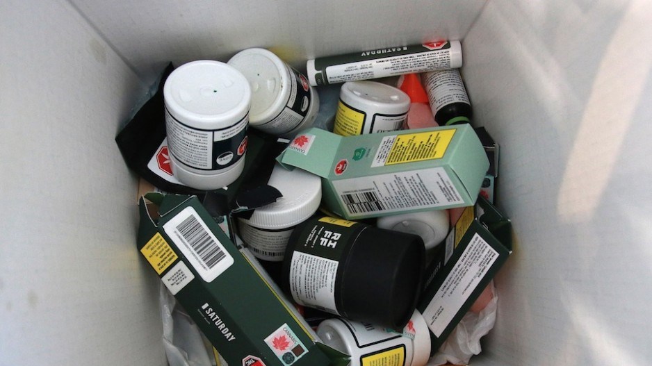 Used and cleaned cannabis packaging from a range of licensed producers sits in a recycling bin at Evergreen Cannabis Society. (via Rob Kruyt)