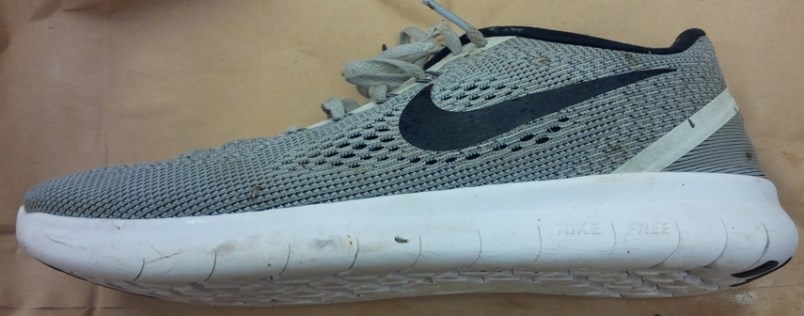 Investigators have released images of a shoe that washed ashore in West Vancouver last summer with a human foot inside. (via West Vancouver Police)
