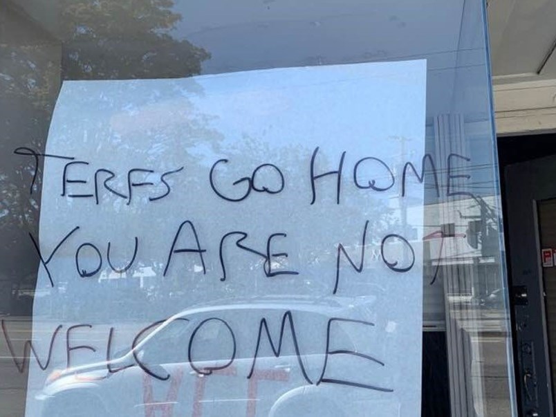 Some of the vandalism left on the windows of the Vancouver Rape Relief and Women’s Shelter storefront. (via Vancouver Rape Relief/Twitter)