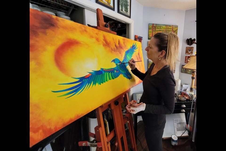 Elaine Burns working on Hope: The thing with wings.
