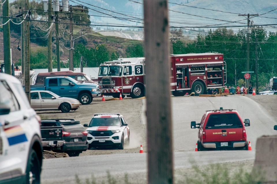 First responders, including police, Kamloops Fire Rescue and the BC Ambulance Service are seen at the corner of Carrier Street and Athabasca Street East in the Mount Paul Industrial Park just before noon on Thursday, May 26. An ammonia leak was reported in the area around 11 a.m., with eight taken to hospital.