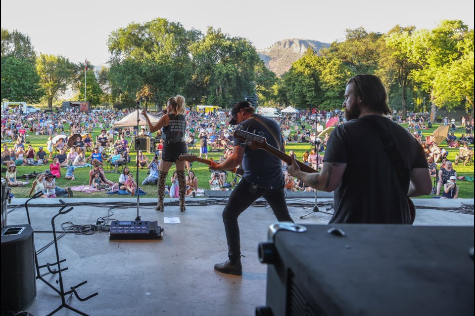 Jess Moskaluke and her band performs at Music in the Park on July 27, 2022.