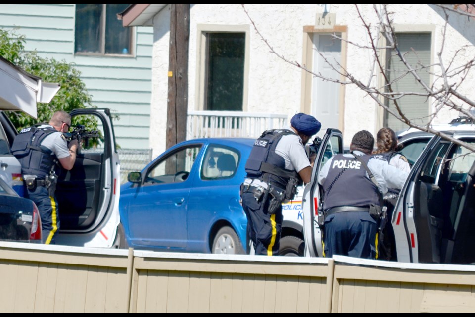 Kamloops Mounties involved in a standoff on Yew Street in July 2022.