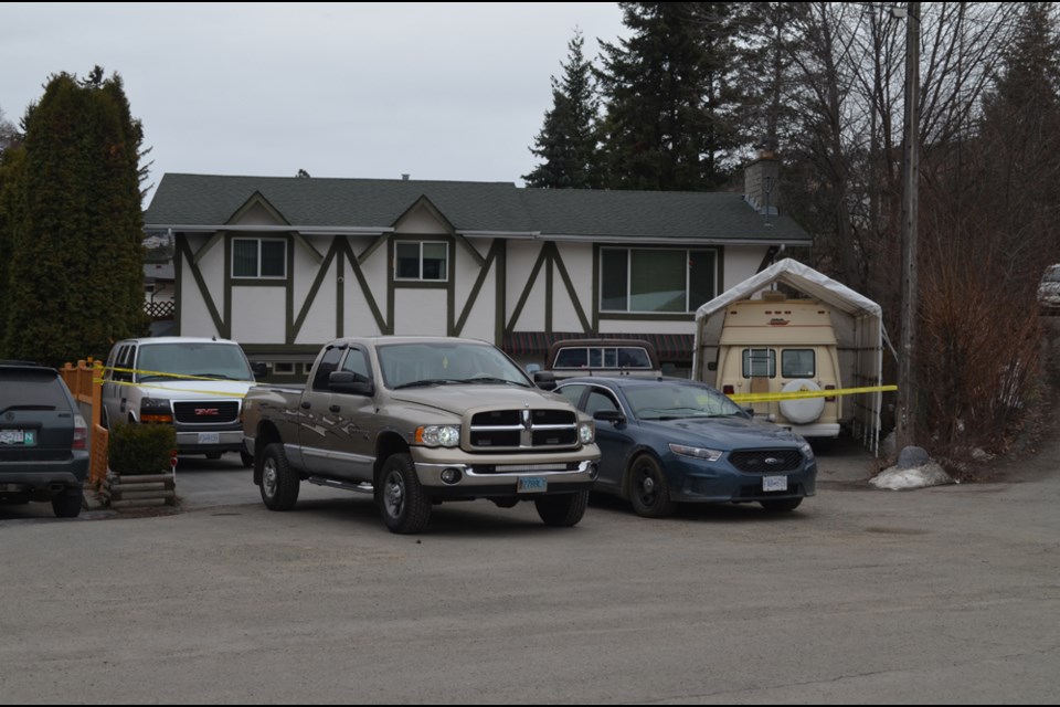 This house on Monterey Place in Dufferin was behind police tape as of March 18, 2022, after a body was found inside a vehicle.