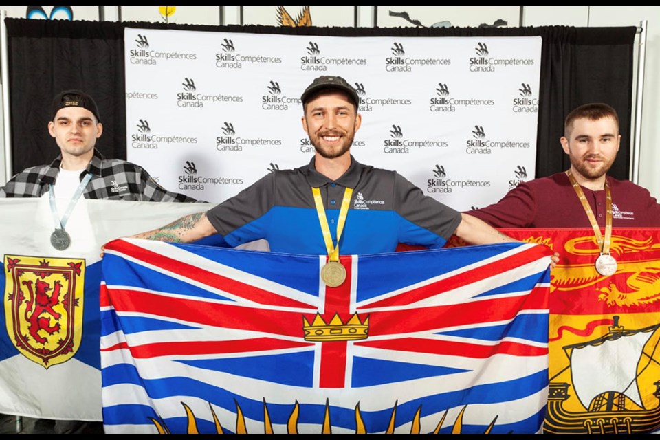 TRU student Hugo Heyes (centre) won gold in the plumbing category at the 2023 Skills Canada National Competition in Winnipeg in May.
 