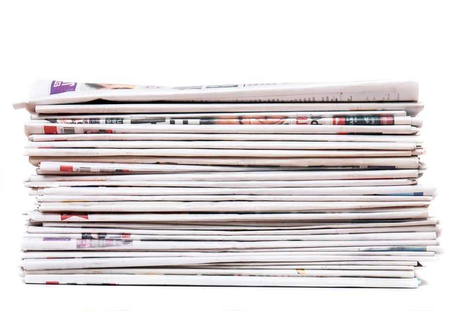stack-of-newspapers