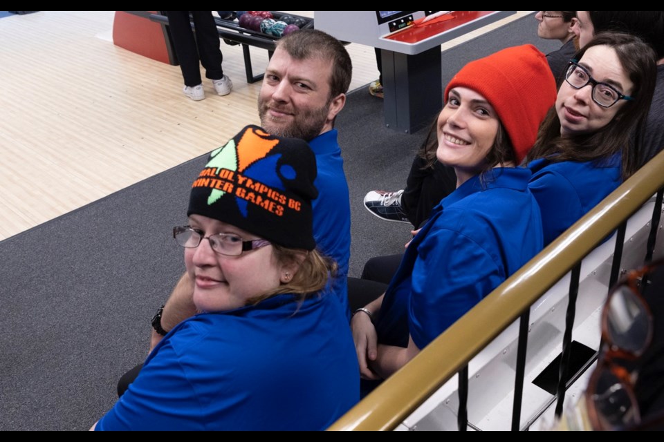 Kamloops athletes pause bowling action at Falcon Lanes to say cheese for a KTW photo.