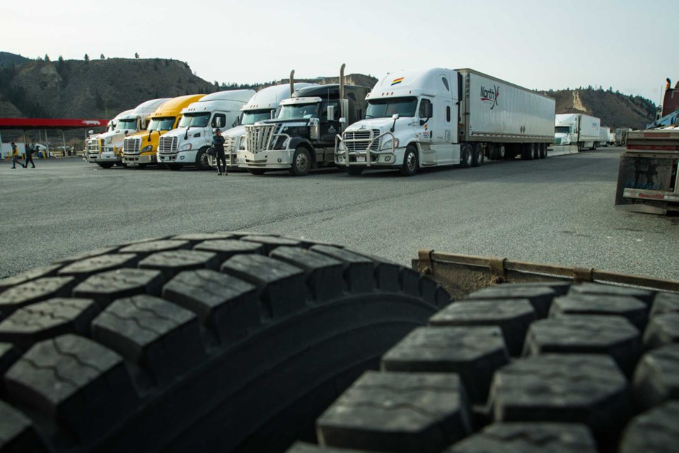 Drivers and their trucks remain stranded at the Gateway Travel Centre east of Kamloops on Nov. 17, 2021, waiting for highway routes to the Lower Mainland to reopen. Weather-related damage on Nov. 14 and Nov. 15 closed all highways between the city and the Coast.