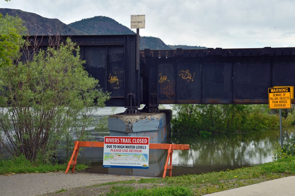 The rivers are rising and public boat launches and some trails — including the path downtown that connects Riverside and Pioneer parks — are now closed.