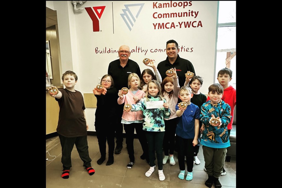 The Kamloops YMCA-YWCA is all smiles after Tim Horton donated $22,729.71 from its Smile Cookie campaign from last summer/fall. 