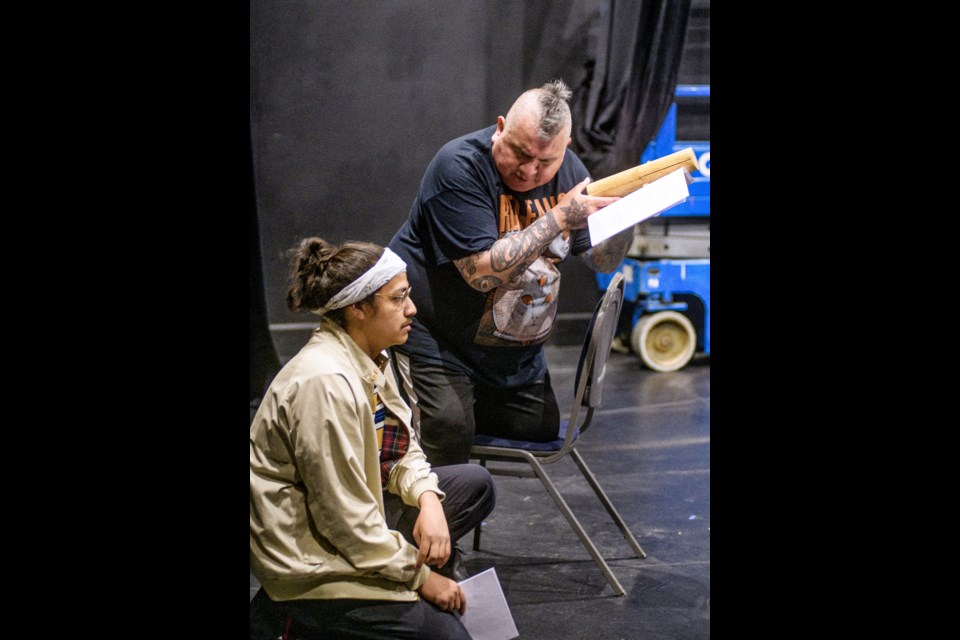 Issiah Bull Bear, as Sunec (left) and Chris Bose, as Abe rehearse a scene Echoes of the Homesick Heart. Western Canada Theatre (WCT) is honoured to conclude its extraordinary 21/22 Season with a World Premiere from one of this region's most compelling, local Indigenous artists. Echoes of the Homesick Heart, a new verbatim theatre project exploring SecwÃ©pemc language reclamation and revitalization from Laura Michel, will close WCT's Courage Series at the Pavilion Theatre from June 02 to 11, 2022.