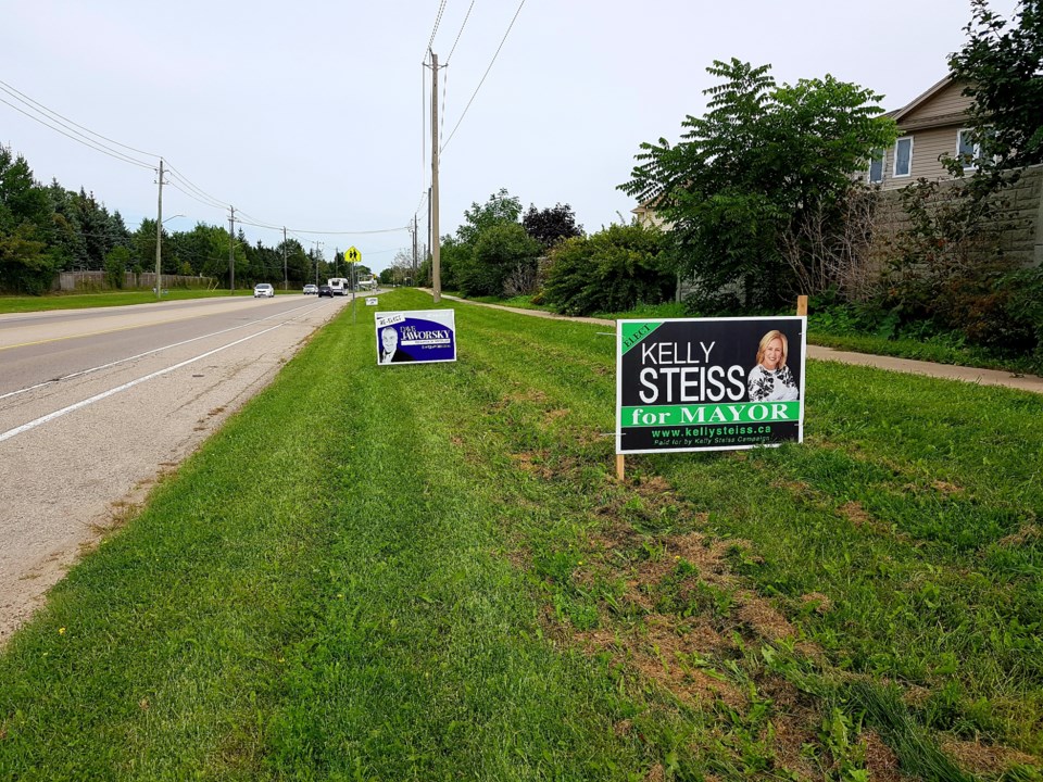 Election signs in Waterloo