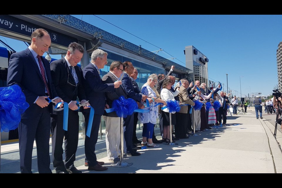Politicians and regional staff cut the ribbon at the opening ceremony to officially launch ION service (June 21, 2019). Mark Pare/KitchenerToday