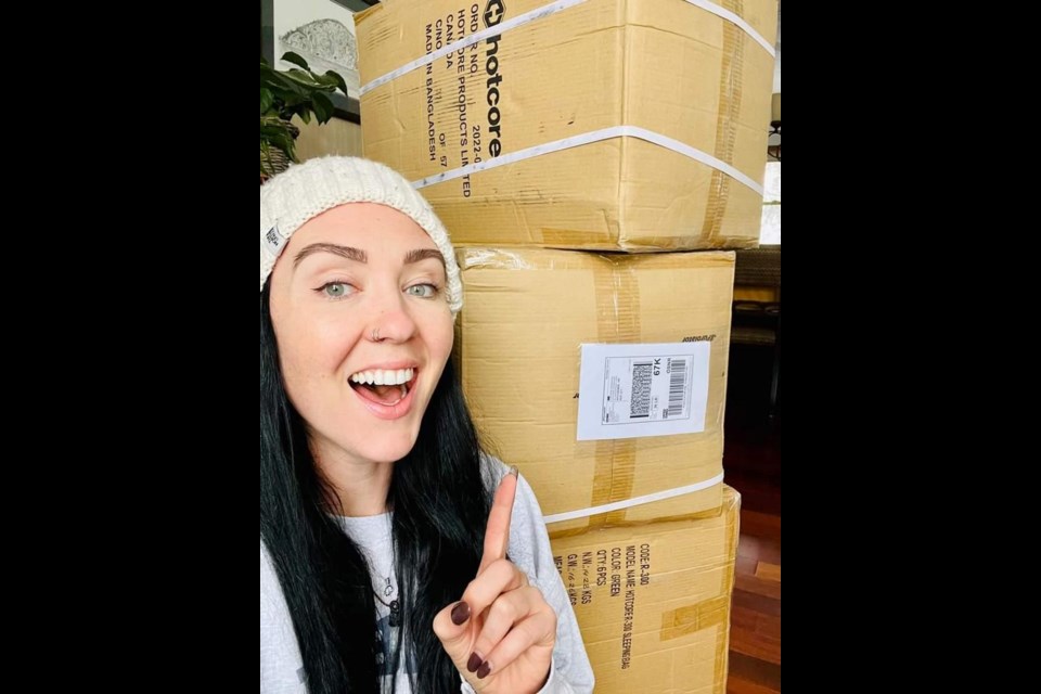 Chivonne Monaghan celebrates her first shipment of sleeping bags
