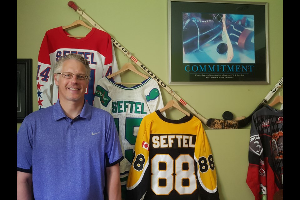 Steve Seftel stands in the basement of his Waterloo home, which is filled with memorabilia from his playing days. Blair Adams/Kitchener Today