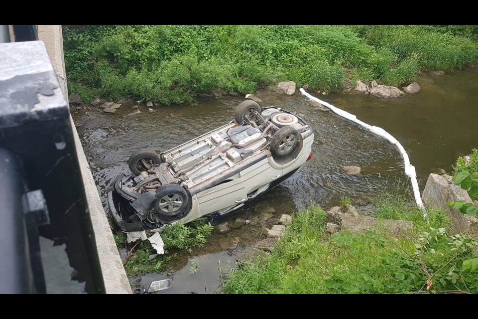 A car ended up in a creek after a crash near Bridge and Lancaster in Kitchener. Mark Pare/KitchenerToday