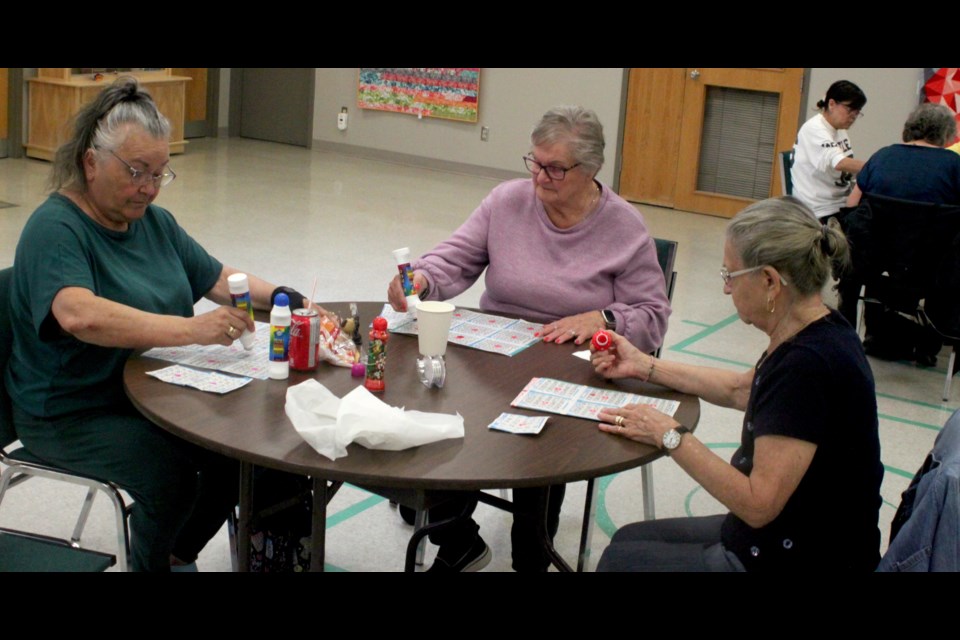 Corrine Bryks, Helen Gauthier, and Barb Chamberlain were part of the large group of local seniors who were at the Lac La Biche Heritage Centre on Tuesday for bingo games. These games are held at the local seniors’ centre on the first and third Tuesday of each month, with the winners taking home the jackpot on offer. Chris McGarry photo. 
