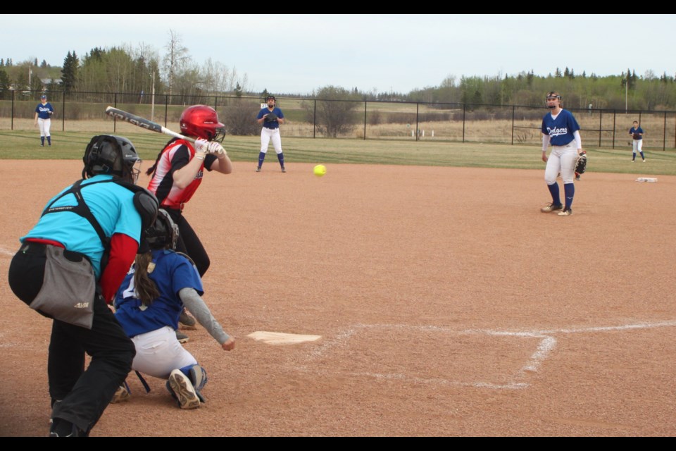 Mustangs batter Alexis Cloutier prepares to hit a ball thrown by Dodgers pitcher Zoe Lett. Chris McGarry photo. 