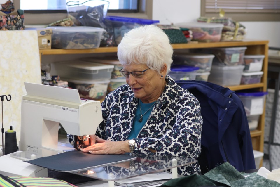 Angele Duncan, treasurer of the Quilting Bees Club, says that the group is a place for individuals who enjoy quilting to come together in friendship, exchange ideas and help one another.