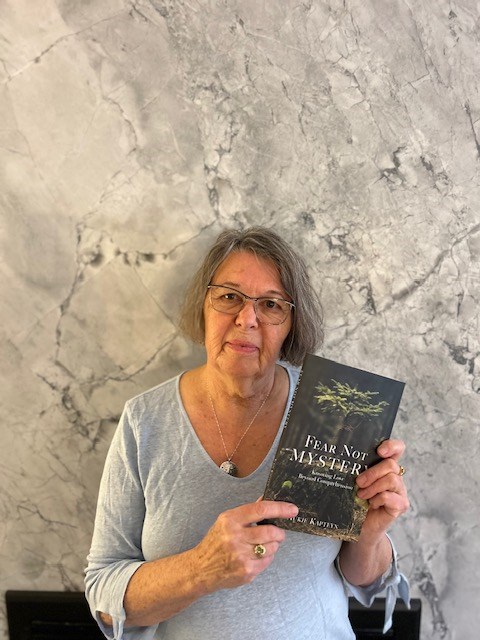 Aukje Kapteyn with her latest book, 'Fear Not Mystery', which was released on Oct. 23. Kapteyn will be coming to Lac La Biche on Dec. 16 to sign copies. Submitted photo. 