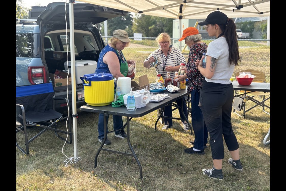 Hot dogs, water, freezies, and watermelon were free for the taking at the Cold Lake and District’s FCSS block party in Lefebvre Heights Park. 