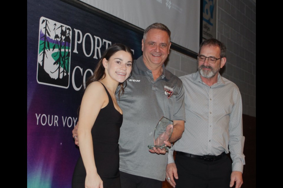 Brooklyn Haub, a member of the Portage College Voyageurs women’s soccer team, was the recipient of the Voyageurs Spirit Award. She’s with Al Bertschi and Al Robertson. Chris McGarry photo.