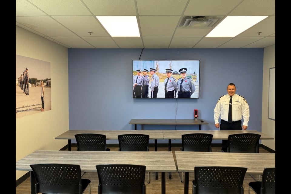Chris Clark, director of training for the Law Enforcement Training Centre in Lac La Biche, stands inside  a new training classroom at the facility. Photo supplied. 