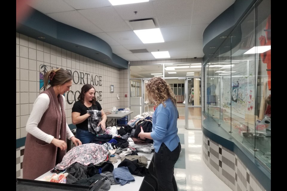Community Social Work Students from Portage College in Cold Lake organized a "Community Clothing Swap," gathering donations of towels, blankets, and warm clothing from generous community members to benefit The John Howard Society.  