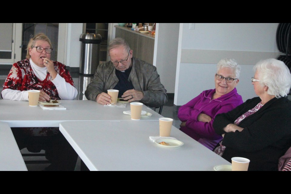 As the weather gets colder, people look for things to do inside during the long period of winter just ahead. Kathryn and Kevin Pederson, Annette Plamondon, and Aleta Mazurek, members of the Coffee Connections Groups which meets every Thursday inside the Tea Room at McArthur Place in Lac La Biche, enjoy each other’s company during the most recent get-together, which took place on Oct. 5. Chris McGarry photo. 