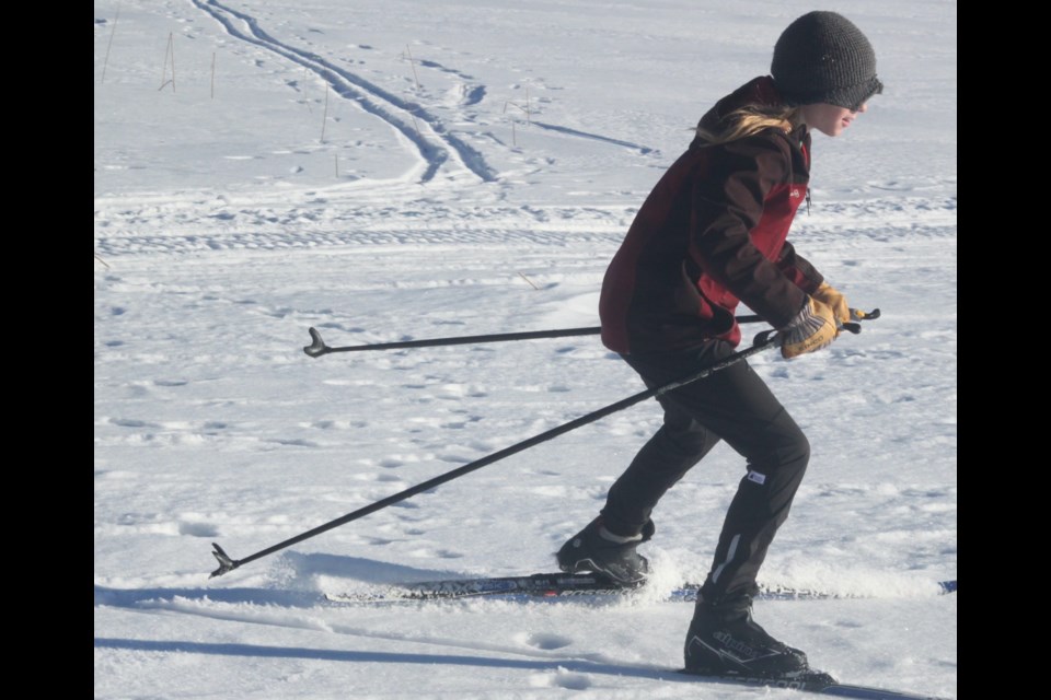 Lac La Biche Nordic Ski Club members have had to pivot their  plans and their practice locations as snow cover on local trails is not deep enough. Here, Corbin Downes and his family was part of local group who took to the frozen surface of Shaw Lake on Sunday afternoon for the club's Jackrabbit program.  Chris McGarry photo.