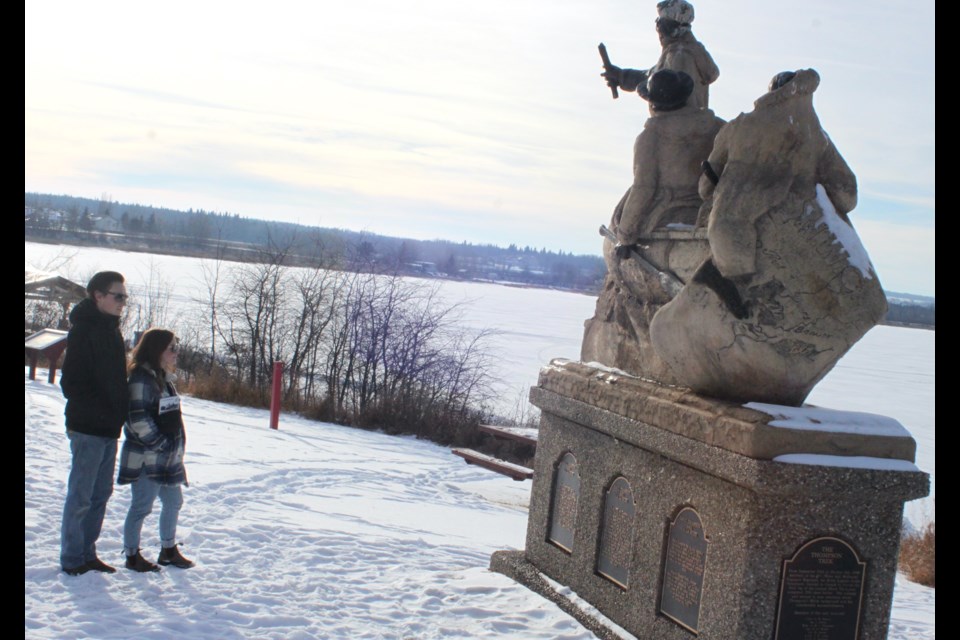 Many people around Lac La Biche took advantage of Saturday’s unseasonably warm temperatures to get outside, including Dan and Lexi Howorko. 

The Calgary couple, who have plans to relocate to Lac La Biche in February, took some time on Saturday afternoon to walk around and get acquainted with their new surroundings. The Howorkos were impressed by the 12-foot monument to famous Canadian explorer and mapmaker David Thompson looking over the shores of Lac La Biche Lake on Churchill Drive. 

Continued warm temperatures are forecasted for much of the upcoming week. 

Chris McGarry photo. 
