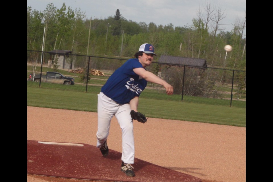 Lac La Biche Dodgers U11 player Dylan McDonald throws a ball for his team during the first inning of Tuesday’s matchup against the visiting Elk Point Sox. Chris McGarry photo. 