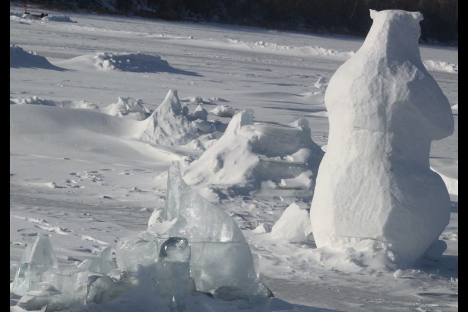 While the three ice sculptures were vandalized-including the eagle-the snow sculptures made during the 2024 Winter Festival of Speed, including this polar bear, remain standing. Chris McGarry photo. 